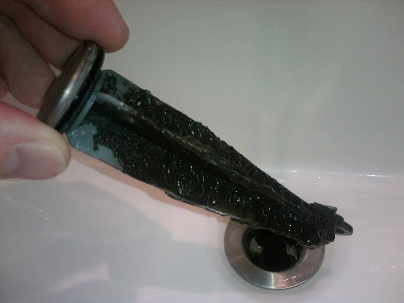 black slime causes stinky drains